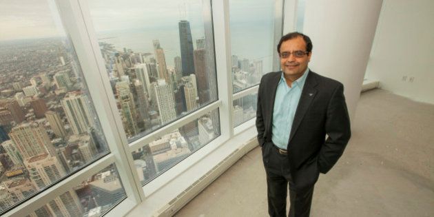 Sanjay Shah, founder and CEO of Vistex, Inc., makes history with his purchase of the Trump International Hotel & Tower penthouse on Monday, December 8, 2014 in Chicago. (Photo by Barry Brecheisen/Invision/AP)