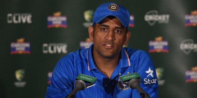 BRISBANE, AUSTRALIA - JANUARY 20: Mahendra Singh Dhoni of India speaks during a press conference after the One Day International match between England and India at The Gabba on January 20, 2015 in Brisbane, Australia. (Photo by Matt Roberts - CA/Cricket Australia/Getty Images)