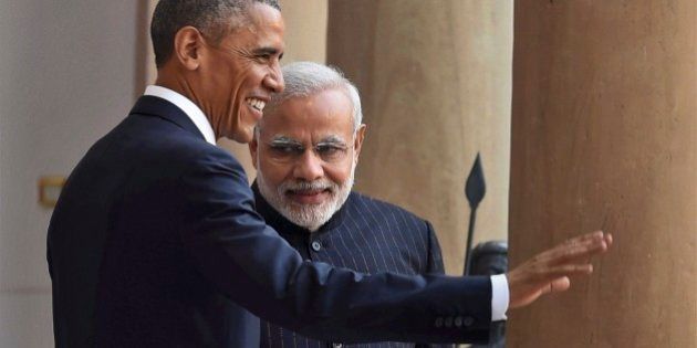 U.S. President Barack Obama, left and Indian Prime Minister Narendra Modi pose for the media before they held their talks, in New Delhi, India, Sunday, Jan. 25, 2015. Seizing on their personal bond, Obama and Modi said Sunday they had made progress on nuclear cooperation and climate change, with Obama declaring a