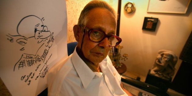 INDIA - NOVEMBER 06: RK Laxman, Cartoonist with a sketch of his most famous character 'Common Man' at his Residence in Mumbai, Maharashtra, India (Photo by Mustafa Quraishi/The India Today Group/Getty Images)