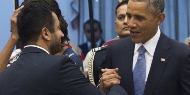 US President Barack Obama greets actor Kal Penn during a receiving line before a State Dinner at Rashtrapati Bhawan, the Presidential Palace, in New Delhi, India, January 25, 2015. AFP PHOTO / SAUL LOEB (Photo credit should read SAUL LOEB/AFP/Getty Images)