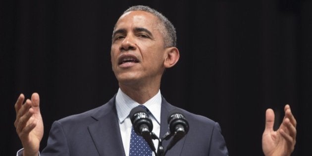 US President Barack Obama speaks on US - India relations during a townhall event at Siri Fort Auditorium in New Delhi on January 27, 2015. President Barack Obama said the United States could be India's 'best partner' January 27 as he wrapped up a three-day visit to New Delhi by highlighting the shared values of the world's biggest democracies. AFP PHOTO / SAUL LOEB (Photo credit should read SAUL LOEB/AFP/Getty Images)