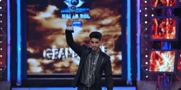 Indian television actor Gautam Gulati poses for a photograph during the 'Bigg Boss Seaon 8' final in Lonavala on January 31, 2015. AFP PHOTO/STR (Photo credit should read STRDEL/AFP/Getty Images)