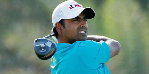 ABU DHABI, UNITED ARAB EMIRATES - JANUARY 16: Anirban Lahiri of India watches his tee shot on the ninth hole during the second round of the Abu Dhabi HSBC Golf Championship at the Abu Dhabi Golf Cub on January 16, 2015 in Abu Dhabi, United Arab Emirates. (Photo by Scott Halleran/Getty Images)