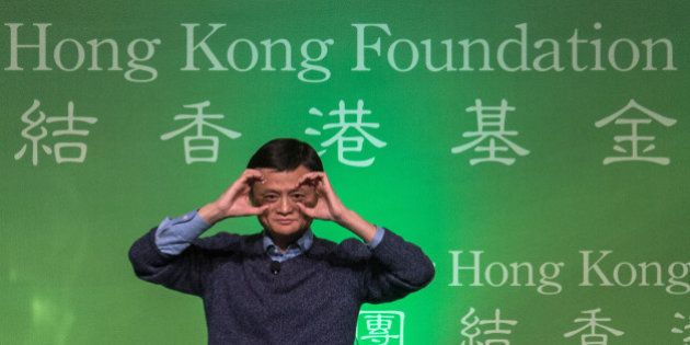 Jack Ma, billionaire and chairman of Alibaba Group Holding Ltd., gestures during an event in Hong Kong, China, on Monday, Feb. 2, 2015. Ma regained his spot as Asia's richest person with a higher valuation for the company's finance affiliate ahead of a stock sale that also created a dozen new billionaires. Photographer: Lam Yik Fei/Bloomberg via Getty Images