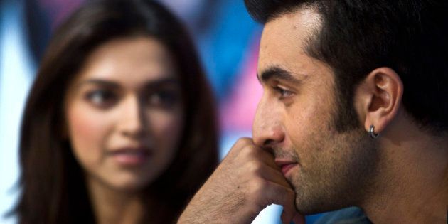 Indian Bollywood actor Ranbir Kapoor gestures next to actress Deepika Padukone during a press conference held to promote their new Hindi film âYeh Jawani Hai Deewaniâ in New Delhi, India, Monday, May 27, 2013. The film will be released on May 31, 2013. (AP Photo/Tsering Topgyal)
