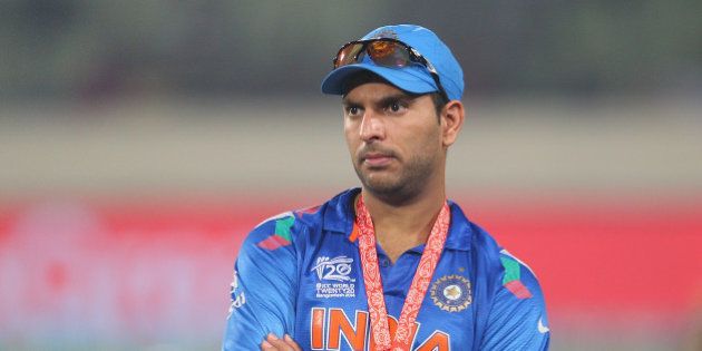 DHAKA, BANGLADESH - APRIL 06: Yuvraj Singh of India looks on during the presentations after the Final of the ICC World Twenty20 Bangladesh 2014 between India and Sri Lanka at Sher-e-Bangla Mirpur Stadium on April 4, 2014 in Dhaka, Bangladesh. (Photo by Scott Barbour/Getty Images)