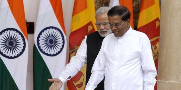 NEW DELHI, INDIA - FEBRUARY 16: Prime Minister Narendra Modi and Sri Lankan President Maithripala Sirisena during a meeting and delegation-level talks at Hyderabad House on February 16, 2015 in New Delhi, India. Sirisena said,'This is my first visit and it has given very fruitful results.' India sealed a nuclear energy agreement with Sri Lanka, its first breakthrough with the new government. (Photo by Virendra Singh Gossain/Hindustan Times via Getty Images)