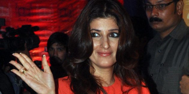 Indian Bollywood actress Twinkle Khanna poses as she attends the opening of a luxury boutique in Mumbai late December 18, 2013. AFP PHOTO/STR (Photo credit should read STRDEL/AFP/Getty Images)