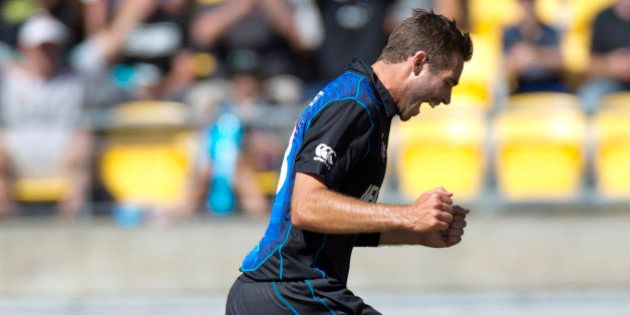 New Zealandâs Tim Southee celebrates after taking his seventh wicket during their Cricket World Cup match against England in Wellington, New Zealand, Friday Feb. 20, 2015. (AP Photo/NZ Herald,Mark Mitchell)