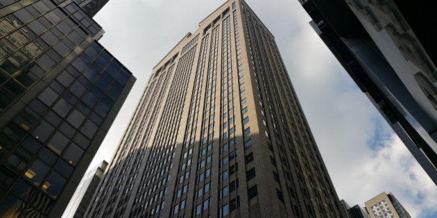 550 Madison Ave., center, stands in New York, U.S., on Wednesday, Feb. 18, 2015. Chetrit Group is converting the former offices of Sony Corp.'s U.S. headquarters at 550 Madison Ave. into luxury residences. Photographer: Kenneth Hughes/Bloomberg via Getty Images