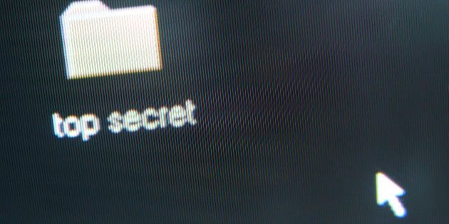 Top secret folder icon on computer screen