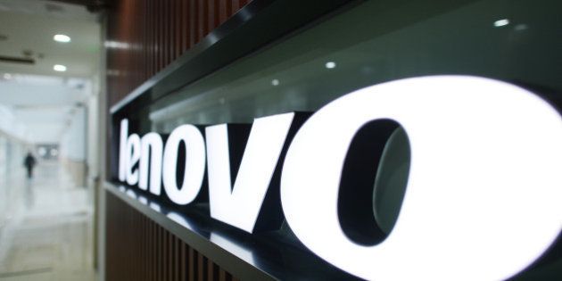 WUHAN, CHINA - DECEMBER 19: (CHINA OUT) A Lenovo's logo is seen at the Lenovo MIDH (Mobile Internet and Digital Home) Wuhan Operation Center on December 19, 2013 in Wuhan, China. The plant will mainly produce Lenovo smart phones and tablet computers with an initial capacity of 30 million units a year. (Photo by ChinaFotoPress/ChinaFotoPress via Getty Images)