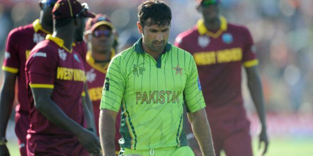 Pakistan's Sohail Khan walks from the field after they lost their Cricket World Cup match to the West Indies by 150 runs in Christchurch, New Zealand, Saturday, Feb. 21, 2015. (AP Photo/Ross Setford)
