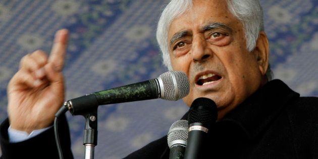 Peoples Democratic Party (PDP) leader Mufti Mohammad Sayeed speaks during an election campaign rally on the outskirts of Srinagar, India, Thursday, April 17, 2014. Several separatist organizations have jointly appealed to the people of Jammu and Kashmir to boycott the Indian parliamentary elections. Nationwide voting began April 7 and runs through May 12, with results for the 543-seat lower house of Parliament to be announced four days later. (AP Photo/Mukhtar Khan)