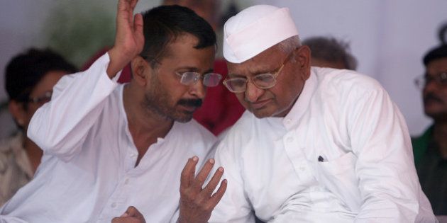 NEW DELHI, INDIA - AUGUST 03: Social activist Anna Hazare having a word with Arvind Kejriwal during their agitation against corruption at Jantar Mantar in New Delhi on Friday, 3rd August, 2012. (Photo by Parveen Negi/India Today Group/Getty Images)