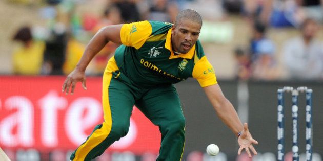 FILE - In this Sunday Feb. 15, 2015, file photo, South African bowler Vernon Philander fields the ball during their Cricket World Cup Pool B match against Zimbabwe in Hamilton, New Zealand. Paceman Vernon Philander has been ruled out of South Africaâs next World Cup match against the West Indies due to a left hamstring injury he picked up in last weekendâs loss to defending champion India. (AP Photo/Ross Setford,File)