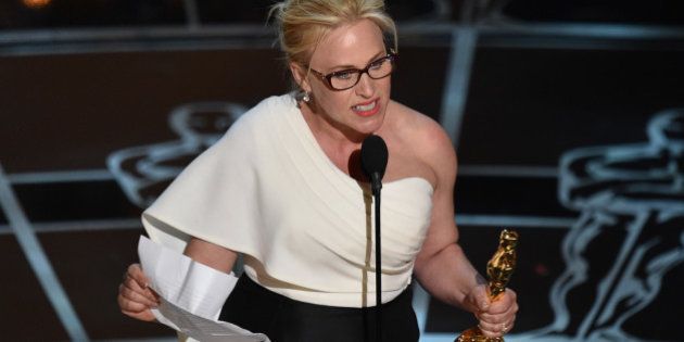 Patricia Arquette accepts the award for best actress in a supporting role for âBoyhoodâ at the Oscars on Sunday, Feb. 22, 2015, at the Dolby Theatre in Los Angeles. (Photo by John Shearer/Invision/AP)