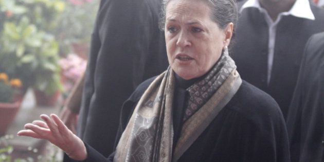NEW DELHI, INDIA - DECEMBER 28: Congress President Sonia Gandhi during Congress Partys 130th foundation day at AICC Headquarters during heavy fog on December 28, 2014 in New Delhi, India. (Photo by Arvind Yadav/Hindustan Times via Getty Images)
