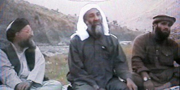 In this undated Photo provided by the United States Attorneyâs Office for the Southern District of New York, defendant Suliman Abu Ghayth, right, is seated with al-Qaida founder Osama Bin Laden, center, and Bin Ladenâs deputy, Ayman al Zawahiri, in Afghanistan. Suliman Abu Ghayth, is being tried in New York, charged with plotting to kill Americans by being a motivational speaker at al-Qaida training camps before the Sept. 11 attacks and as a spokesman for the terror group afterward when it sought to recruit more militants to its cause. (AP Photo/US Attorneyâs Office for the Southern District of New York)