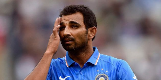 India's Mohammed Shami prepares to bowl against Australia during their One Day International cricket match in Melbourne, Sunday, Jan. 18, 2015. (AP Photo/Andy Brownbill)