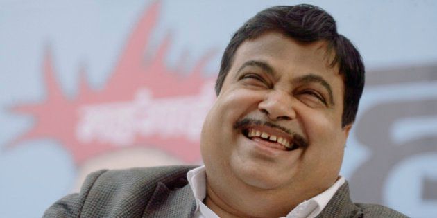 India's main opposition Bharatiya Janata Party president Nitin Gadkari laughs at a rally to protest against the rising prices of essential commodities in New Delhi, India, Wednesday, Feb. 10, 2010. Indiaâs food price rises drove a 7.3 percent jump in the headline wholesale price index in December, and inflation has begun to spread to non-food sectors as well.(AP Photo/Gurinder Osan)