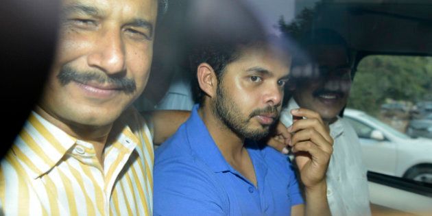 NEW DELHI, INDIA - MAY 21: Cricketer S Sreesanth being produced at Saket court in New Delhi on Tuesday for his alleged links with bookies accused of spot fixing in the IPL ongoing edition. (Photo by K Asif/India Today Group/Getty Images)