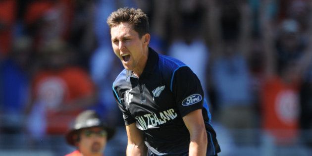 New Zealandâs Trent Boult celebrates after taking the wicket of Australia's Mitchell Starc for no score during their Cricket World Cup match in Auckland, New Zealand, Saturday, Feb. 28, 2015. (AP Photo Ross Setford)