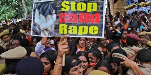 Women activists of Bhartiya Janata Party (BJP) scuffle with policewomen as they are prevented to proceed during a protest against recent incidents of rape of schoolgirls, in Bangalore, India, Wednesday, Nov. 5, 2014. Two people have been arrested by police in two separate incidents of rape of a 3 -year-old and 6-year-old girl of two different schools last month in this technology hub of India. Indian officials, who for decades had done little about sexual violence, have faced growing public anger since the December 2012 fatal gang rape of a young woman on a moving New Delhi bus, an attack that sparked national outrage. (AP Photo/Aijaz Rahi)