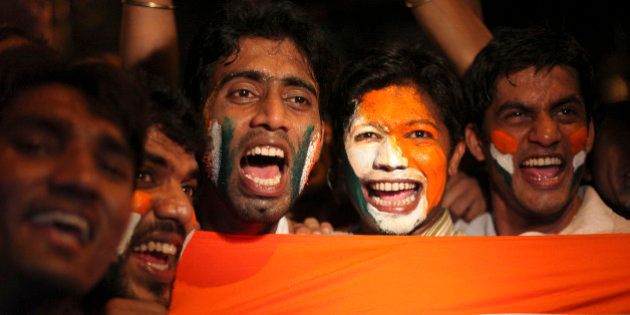 Indians celebrate after their team won the ICC World Cup cricket semifinal match against Pakistan, in Mumbai, India, Wednesday, March 30, 2011. India upstaged archrival Pakistan by 29 runs in the so-called
