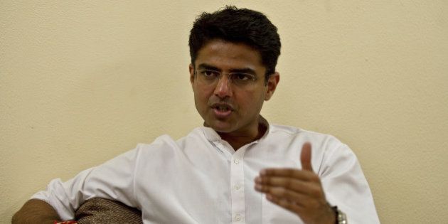 Indian Minister of Corporate Affairs Sachin Pilot gestures during an interview with AFP at his residence in New Delhi on September 27, 2013. AFP PHOTO/ MANAN VATSYAYANA (Photo credit should read MANAN VATSYAYANA/AFP/Getty Images)