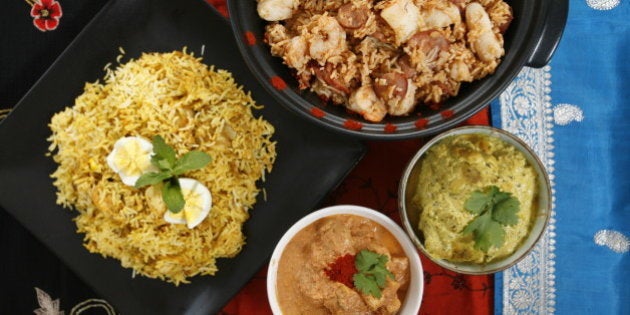 DESI_food : December, 19, 2007: Various indian food dishes prepared by Smita Chandra for her article. In this pic: Clockwise from centre left: Mapillah Biryani, Goan Paella, Dhauiya Kaju Korma, Chicken Tikka Masala. (Tory Zimmerman/Toronto Star) (Photo by Tory Zimmerman/Toronto Star via Getty Images)