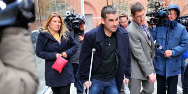 BOSTON - MARCH 4: Opening statements in the trial of the Boston Marathon bomber took place at Moakley Federal Courthouse on March 4, 2015. Marc Fucarile, who lost his leg in the bombings, leaves court. (Photo by John Tlumacki/The Boston Globe via Getty Images)