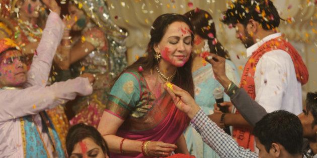 NEW DELHI, INDIA - MARCH 5: Bollywood actress and BJP MP from Mathura, Hema Malini takes part in the Holi celebration programme at CGA ground near Karkardooma Court on March 5, 2015 in New Delhi, India. (Photo by Sushil Kumar/Hindustan Times via Getty Images)