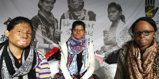 NEW DELHI, INDIA - DECEMBER 16: Acid attack victims sit on indefinite hunger strike on the 5th day demanding fast-track court for violence against women at Jantar Mantar on December 16, 2014 in New Delhi, India. (Photo by Arun Sharma/Hindustan Times via Getty Images)