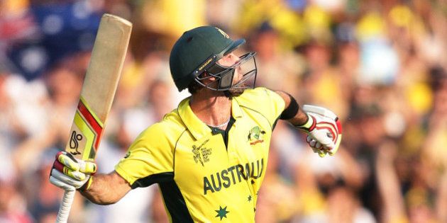 Australia's Glenn Maxwell celebrates after scoring a century while batting against Sri Lanka during their Cricket World Cup Pool A match in Sydney, Australia, Sunday, March 8, 2015. (AP Photo/Rob Griffith)