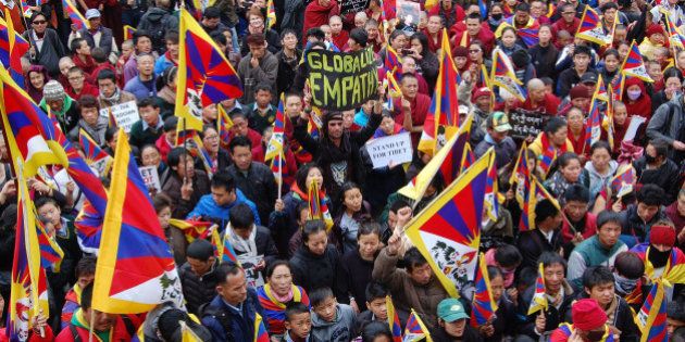 DHARAMSALA, INDIA - MARCH 10: Members of the Tibetan Youth Congress take part in a demonstration to mark the 55th anniversary of the failed uprising in the Tibetan capital Lhasa in 1959 on March 10, 2014 in Dharamsala, India. The group demonstrated in support of the 127 people who have self-immolated to protest China's policy towards Tibet and pressed China to allow independent media into Tibet. (Photo by Shyam Sharma/Hindustan Times via Getty Images)