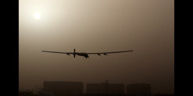 The Solar Impulse 2, takes off from al-Bateen airport in Abu Dhabi as it heads to Muscat, on March 9, 2015, in the first attempt to fly around the world in a plane using solar energy. The first attempt to fly around the world in a plane using only solar power launched on March 9 in Abu Dhabi in a landmark journey aimed at promoting green energy. AFP PHOTO / MARWAN NAAMANI (Photo credit should read MARWAN NAAMANI/AFP/Getty Images)