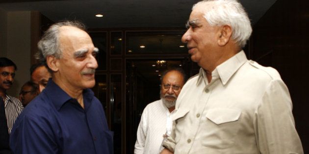 NEW DELHI, INDIA â JULY 22: Arun Shourie (left) with BJP leader Jaswant Singh during the launch of his book Does He Know a Mother's Heart? How Suffering Refutes Religions in New Delhi on Friday, July 22, 2011.(Photo by Sipra Das/India Today Group/Getty Images)