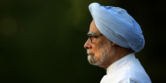 Outgoing Indian prime minister Manmohan Singh leaves after paying homage to former Indian prime minister Rajiv Gandhi on his death anniversary at his memorial, in New Delhi, India, Wednesday, May 21, 2014. Rajiv Gandhi was killed by an ethnic Tamil suicide bomber in May 1991 as he campaigned for a return to the post of prime minister. He was 47 years old. (AP Photo /Manish Swarup)