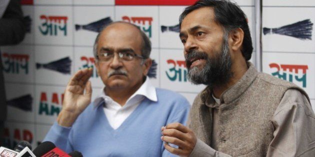 NEW DELHI, INDIA - DECEMBER 18: Aam Aadmi Party leaders Yogendra Yadav (R) with Prashant Bhushan during a press conference at North Avenue, on December 18, 2014 in New Delhi, India. Party expected more than 5,000 volunteers to arrive in Delhi for the 2015 Delhi assembly elections. (Photo by Arvind Yadav/Hindustan Times via Getty Images)