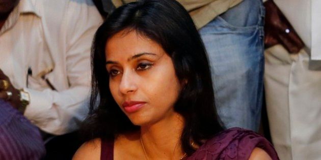 Indian diplomat Devyani Khobragade offers her respects at Chaitya Bhoomi, a memorial to Indian freedom fighter B.R. Ambedkar, in Mumbai, India, Tuesday, Jan. 14, 2014. Khobragade, India's deputy consul general in New York, was indicted by a U.S. federal grand jury on accusations that she exploited her Indian-born housekeeper and nanny, allegedly having her work more than 100 hours a week for low pay and lying about it on a visa form. She denies the charge. (AP Photo/Rajanish Kakade)
