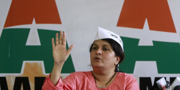 MUMBAI, INDIA - FEBRUARY 26: AAP leader Anjali Damania addressing a press meet at AAP office, Andheri on February 26, 2013 in Mumbai, India. AAP state convenor Anjali Damania is contesting 2014 Lok Sabha Polls as an AAP Candidate from Nagpur against prominent BJP Leader Nitin Gadkari. (Photo by Satish Bate/Hindustan Times via Getty Images)