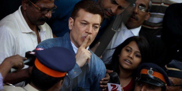 MUMBAI, INDIA - MARCH 8: Bollywood actor Aditya Pancholi produced at the Bandra court and granted bail, after being arrested for assaulting a bouncer at a pub in Juhu, on March 8, 2015 in Mumbai, India. According to the Santacruz Police, Pancholi, who was allegedly under the influence of alcohol, was annoyed at a disc jockey at a Juhu-Tara Road night club in Juhu, after he did not play the songs he had requested. (Photo by Satish Bate/Hindustan Times via Getty Images)