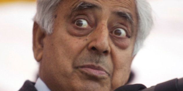 Jammu and Kashmir People's Democratic Party leader Mufti Mohammad Sayeed addresses an election campaign rally at Jhiri village in the outskirts of Jammu, India, Friday, Dec. 19, 2008. (AP Photo/Channi Anand)