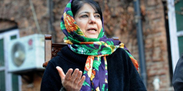 Kashmir's People's Democratic Party (PDP) President Mehbooba Mufti addresses a press conference on the execution of Kashmiri separatist, Mohammed Afzal Guru, in Srinagar on February 10, 2013. Mufti condemned the hanging of Muhammad Afzal Guru, a Kashmiri Muslim who was convicted of involvement in a deadly 2001 attack on the Indian parliament, in New Delhi's Tihar jail where he had been lodged for more than 10 years. AFP PHOTO/Rouf BHAT (Photo credit should read ROUF BHAT/AFP/Getty Images)