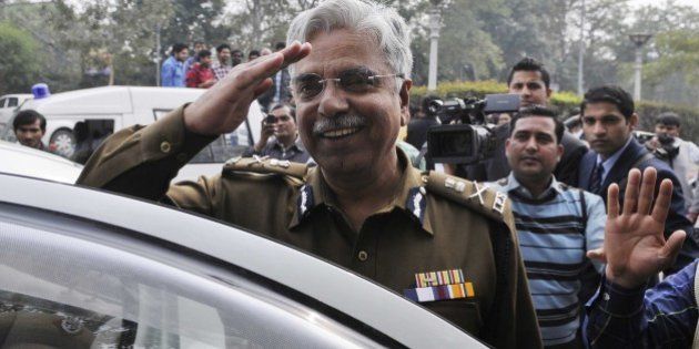 NEW DELHI, INDIA - FEBRUARY 16: Delhi Commissioner of Police, BS Bassi after meeting with the Delhi Chief Minister Arvind Kejriwal on his first day after taking oath a Delhi CM, as the media persons were not allowed the entry at Delhi Secretariat on February 16, 2015 in New Delhi, India. As media persons protested and demanded an answer to the ban of even accredited journalists inside the Delhi government office. Media persons were not allowed to visit the rooms of ministers and other offices inside the Delhi Secretariat. AAP government had restricted media entry inside the secretariat. (Photo by Sushil Kumar/Hindustan Times via Getty Images)