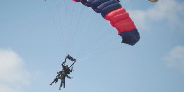 PRETORIA, SOUTH AFRICA - APRIL 10 (SOUTH AFRICA, UAE, BRAZIL AND TURKEY OUT): Cornelis 'Kees' van Dam celebrates his 100th birthday with a parachute jump with instructor Robert Verner at the Pretoria Parachuting Club on 10 April 2011in Pretoria, South Africa. (Photo by Foto24/Gallo Images/Getty Images)