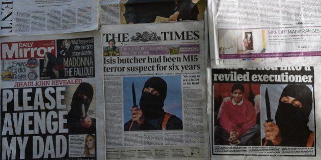 An arrangment of British daily newspapers photographed in London on February 27, 2015 shows the front-page headlines and stories regarding the identification of the masked Islamic State group militant dubbed 'Jihadi John'. The British headlines were dominated on Febryary 27 by the story of the identification of the Islamic State executioner. 'Jihadi John', the masked Islamic State group militant believed responsible for beheading of at least five Western hostages, has been named as Kuwaiti-born computing graduate Mohammed Emwazi from London. AFP PHOTO / DANIEL SORABJI (Photo credit should read DANIEL SORABJI/AFP/Getty Images)