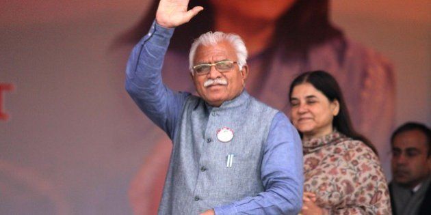 PANIPAT, INDIA - JANUARY 22: Haryana Chief Minister Manohar Lal Khattar waves to the crowd at launch of Beti Bachao Beti Padhao programme on January 22, 2015 in Panipat, India. The Beti Bachao Beti Padhao campaign, which means Save the girl child, educate the girl child, aims to address the issue of declining Child Sex Ratio (CSR) through a mass campaign across the country targeted at changing societal mindsets and creating awareness about the criticality of the issue. (Photo by Ravi Kumar/Hindustan Times via Getty Images)